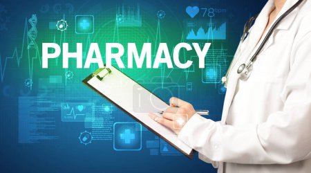 Photo for Young doctor writing down notes with PHARMACY inscription, healthcare concept - Royalty Free Image