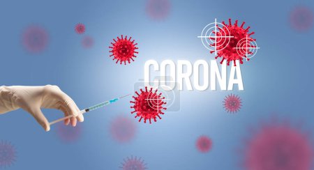 Téléchargez les photos : Vue rapprochée des médecins dans une seringue à gants blancs avec inscription CORONA, concept d'antidote au coronavirus - en image libre de droit