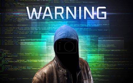 Photo for Faceless hacker with WARNING inscription on a binary code background - Royalty Free Image