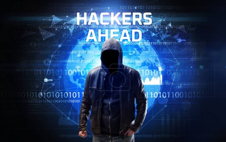 Téléchargez les photos : Hacker sans visage au travail avec HACKERS AHEAD inscription, Concept de sécurité informatique - en image libre de droit