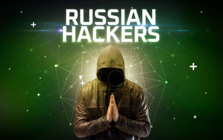 Photo for Mysterious hacker with RUSSIAN HACKERS inscription, online attack concept inscription, online security concept - Royalty Free Image