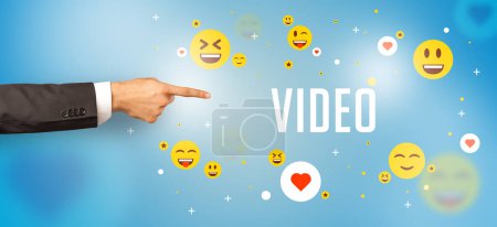 Photo for Close-Up of cropped hand pointing at VIDEO inscription, social media concept - Royalty Free Image