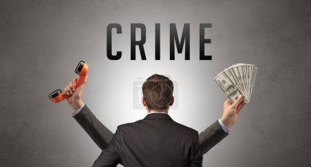 Téléchargez les photos : Vue arrière d'un homme d'affaires avec inscription CRIME, concept de cybersécurité - en image libre de droit