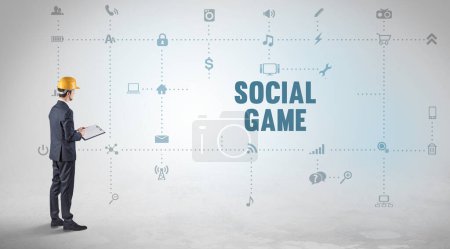 Foto de Ingeniero trabajando en una nueva plataforma de redes sociales con concepto de inscripción SOCIAL GAME - Imagen libre de derechos