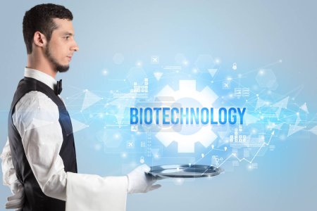 Photo for Waiter serving new technology concept with BIOTECHNOLOGY inscription - Royalty Free Image