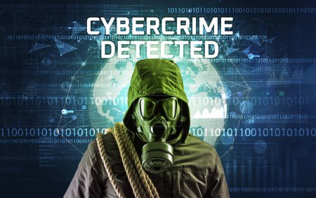 Téléchargez les photos : Hacker sans visage au travail avec inscription CYBERCRIME DETECTED, concept de sécurité informatique - en image libre de droit
