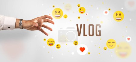 Photo for Close-Up of cropped hand pointing at VLOG inscription, social media concept - Royalty Free Image