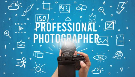 Photo for Hand taking picture with digital camera and PROFESSIONAL PHOTOGRAPHER inscription, camera settings concept - Royalty Free Image