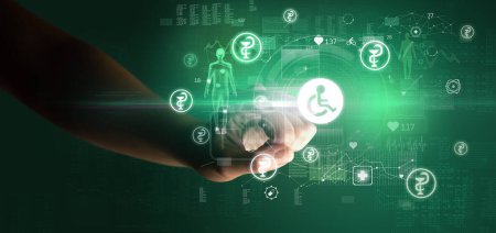 Téléchargez les photos : Médecin main appuyant sur dispositif de santé futuriste avec symbole handicapé à l'écran, concept futuriste - en image libre de droit