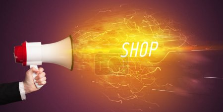 Photo for Young girld shouting in megaphone with SHOP inscription, online shopping concept - Royalty Free Image