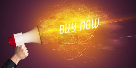 Photo for Young girld shouting in megaphone with BUY NOW inscription, online shopping concept - Royalty Free Image