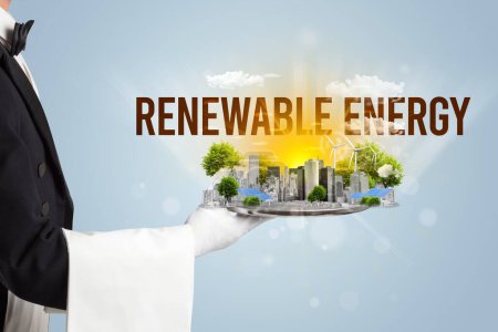 Photo for Waiter serving eco city with RENEWABLE ENERGY inscription, renewabke energy concept - Royalty Free Image