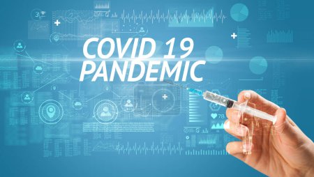 Téléchargez les photos : Aiguille seringue avec vaccin contre le virus et inscription COVID 19 PANDEMIC, concept antidote - en image libre de droit