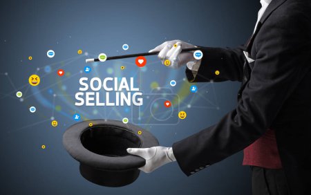 Photo for Magician is showing magic trick with SOCIAL SELLING inscription, social media marketing concept - Royalty Free Image