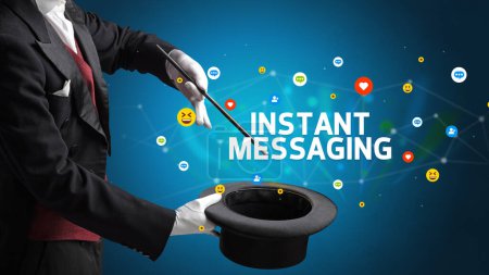 Photo for Magician is showing magic trick with INSTANT MESSAGING inscription, social media marketing concept - Royalty Free Image