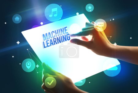 Foto de Tableta futurista con inscripción MACHINE LEARNING, concepto de nueva tecnología - Imagen libre de derechos