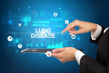 Photo for Close-up of a touchscreen with LUNG DISEASE inscription, medical concept - Royalty Free Image