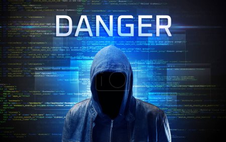 Photo for Faceless hacker with DANGER inscription on a binary code background - Royalty Free Image