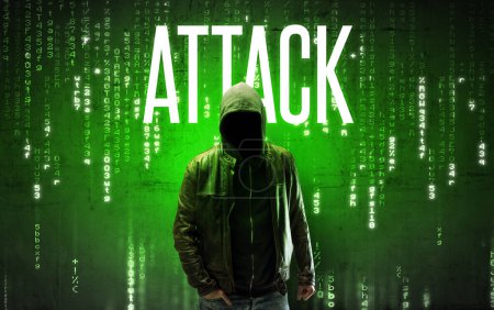 Foto de Hacker sin rostro con inscripción ATTACK, concepto de hacking - Imagen libre de derechos