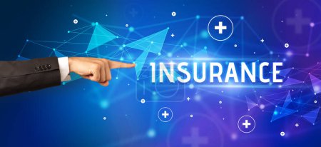 Photo for Close-Up of cropped hand pointing at INSURANCE inscription, medical concept - Royalty Free Image