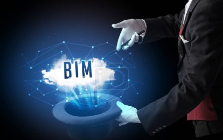 Photo for Magician is showing magic trick with BIM abbreviation, modern tech concept - Royalty Free Image