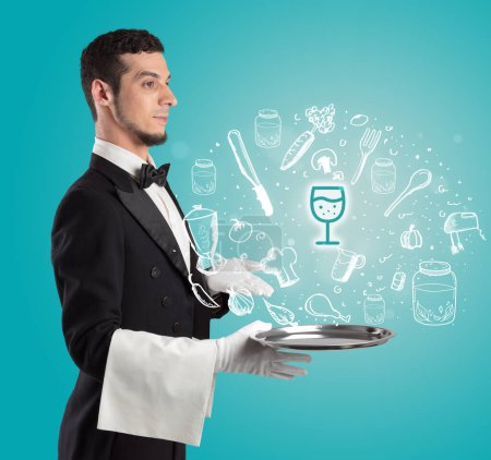 Foto de Camarero sosteniendo bandeja de plata con iconos de copa de vino saliendo de ella, concepto de comida saludable - Imagen libre de derechos