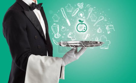 Photo for Waiter holding silver tray with apple icons coming out of it, health food concept - Royalty Free Image