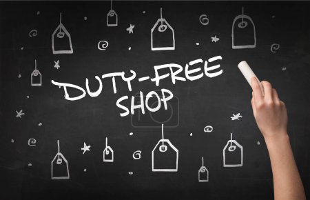 Photo for Hand drawing DUTY-FREE SHOP inscription with white chalk on blackboard, online shopping concept - Royalty Free Image