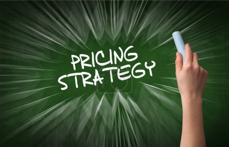 Photo for Hand drawing PRICING STRATEGY inscription with white chalk on blackboard, online shopping concept - Royalty Free Image