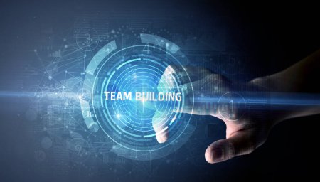 Photo for Hand touching TEAM BUILDING button, modern business technology concept - Royalty Free Image