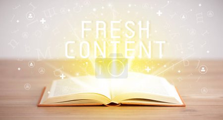 Photo for Open book with FRESH CONTENT inscription, social media concept - Royalty Free Image