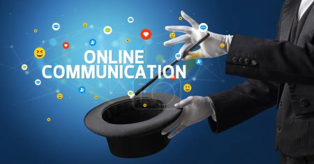 Photo for Magician is showing magic trick with ONLINE COMMUNICATION inscription, social media marketing concept - Royalty Free Image