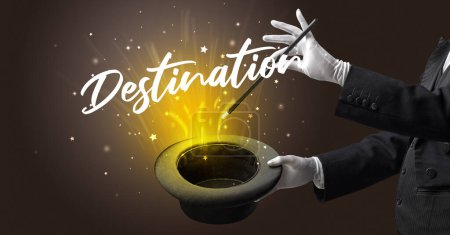 Photo for Magician is showing magic trick with Destination inscription, traveling concept - Royalty Free Image
