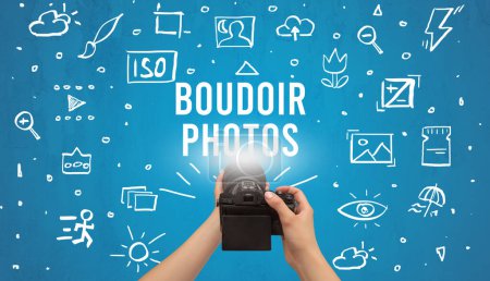 Photo for Hand taking picture with digital camera and BOUDOIR PHOTOS inscription, camera settings concept - Royalty Free Image