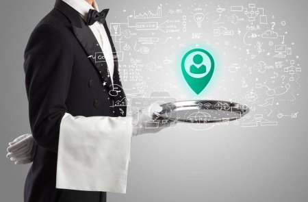 Photo for Close-up of waiter serving location share icons, social media concept - Royalty Free Image