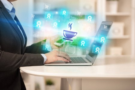 Photo for Businessman working on laptop with coffee icons coming out from it, successful business concept - Royalty Free Image