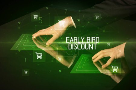 Photo for Online shopping with EARLY BIRD DISCOUNT inscription concept, with shopping cart icons - Royalty Free Image
