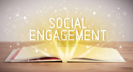Photo for Open book with SOCIAL ENGAGEMENT inscription, social media concept - Royalty Free Image
