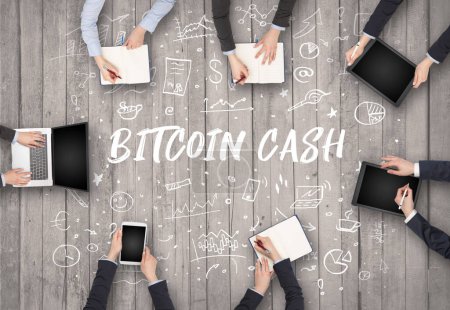 Photo for Group of business people working in office with BITCOIN CASH inscription, coworking concept - Royalty Free Image