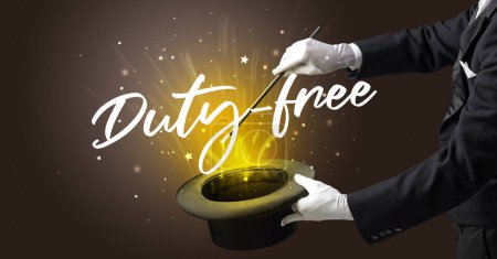 Photo for Magician is showing magic trick with Duty-free inscription, traveling concept - Royalty Free Image