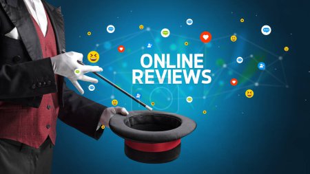 Photo for Magician is showing magic trick with ONLINE REVIEWS inscription, social media marketing concept - Royalty Free Image