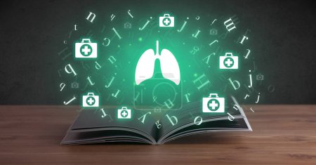 Photo for Open medical book with lungs icons above, global health concept - Royalty Free Image
