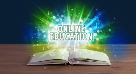 Photo for ONLINE EDUCATION inscription coming out from an open book, educational concept - Royalty Free Image