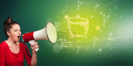 Photo for Young person shouting in megaphone and hot pot icon, healthy eating concept - Royalty Free Image