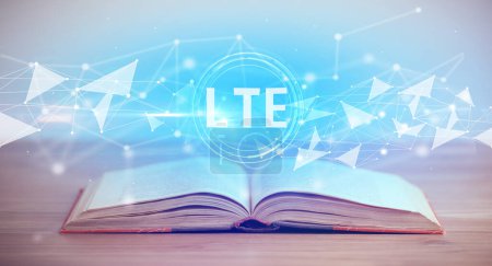 Photo for Open book with LTE abbreviation, modern technology concept - Royalty Free Image