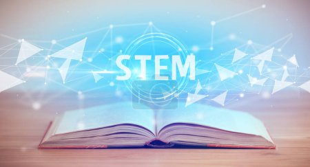 Photo for Open book with STEM abbreviation, modern technology concept - Royalty Free Image