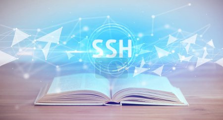 Photo for Open book with SSH abbreviation, modern technology concept - Royalty Free Image
