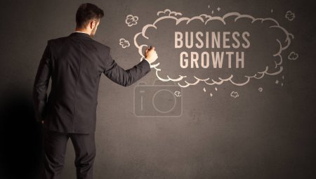 Photo for Businessman drawing a cloud with BUSINESS GROWTH inscription inside, modern business concept - Royalty Free Image
