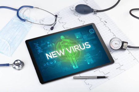 Photo for Tablet pc and doctor tools with NEW VIRUS inscription, coronavirus concept - Royalty Free Image