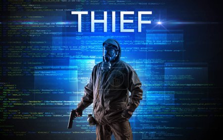 Foto de Hacker sin rostro con la inscripción THIEF en un fondo de código binario - Imagen libre de derechos